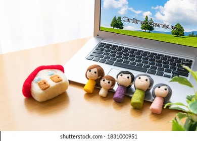 Family Doll And PC For Online Census (image Of Online Census).