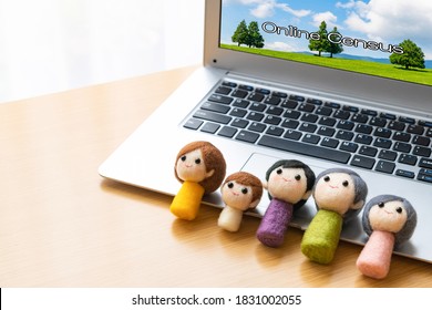 Family Doll And PC For Online Census (image Of Online Census)