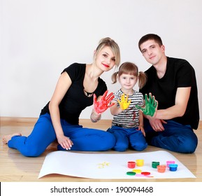 Family Draws Colored Paint With Your Fingers