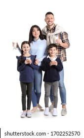 Family Drinking Milk On White Background