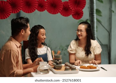 Family Drinking Tea With Dessert - Powered by Shutterstock