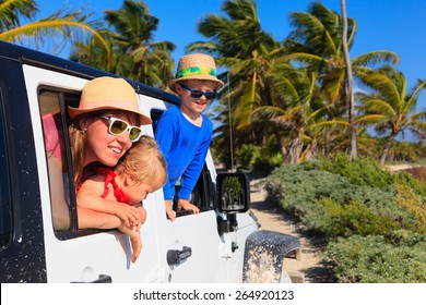 Family Driving Off-road Car On Tropical Beach, Vacation Concept