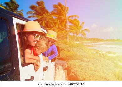 Family Driving Off-road Car On Tropical Beach, Vacation Concept