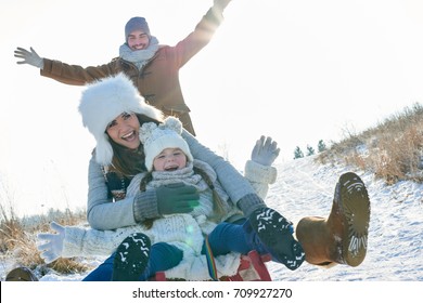 Family Driving Togobban In Winter And Having Fun