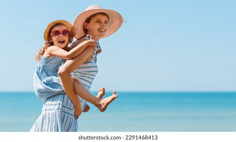 A family during summer vacations on a trip to the sea. - Powered by Shutterstock
