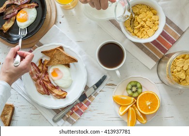 Family Eating American Breakfast