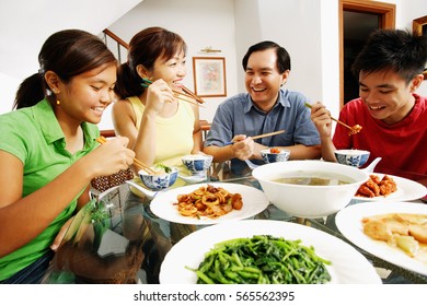 Family eating dinner at home