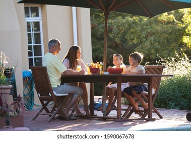 Family Eating Garden Stock Photo 1590067678 | Shutterstock