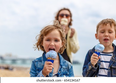 Family Eating Ice Cream In Eastbourne, UK