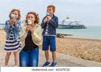 Family Eating Ice Cream In Eastbourne, UK