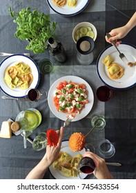 Family Eating Pasta Top View