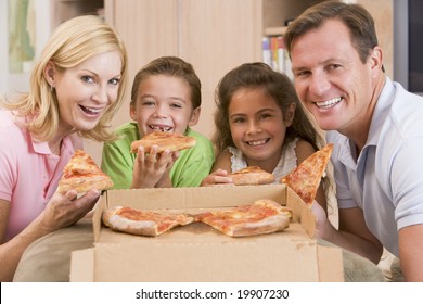 Family Eating Pizza Together