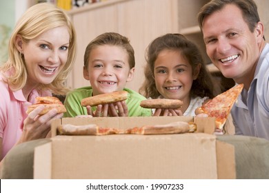 Family Eating Pizza Together