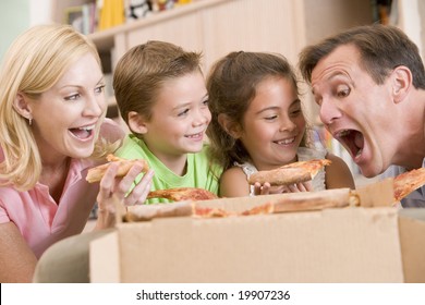 Family Eating Pizza Together