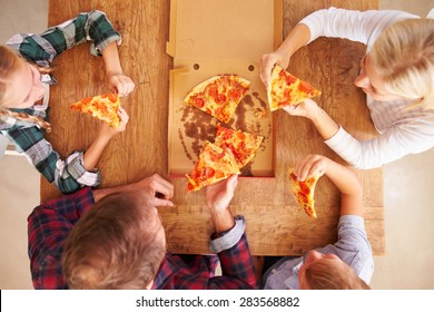 Family Eating Pizza Together, Overhead View
