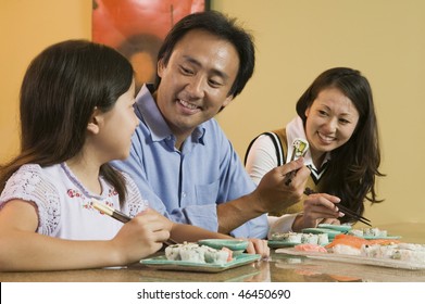 Family Eating Sushi Together