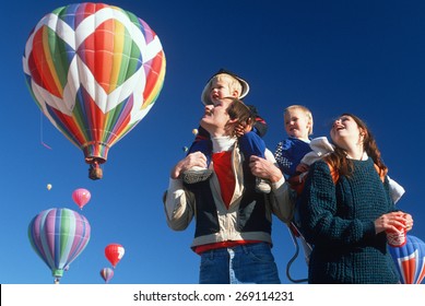 A Family Enjoying The Albequerque Hot Air Balloon Festival, NM