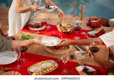 Family enjoying christmas dinner southern hemisphere - Powered by Shutterstock