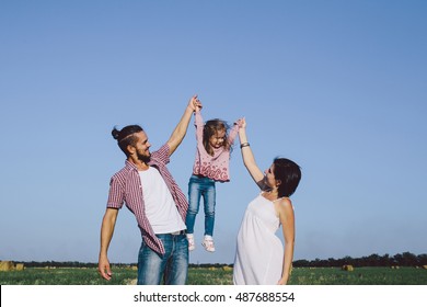 family enjoying life outdoor - Shutterstock ID 487688554