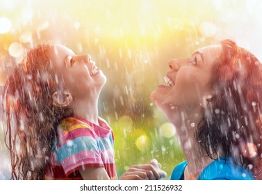 The Family Enjoys The Rain