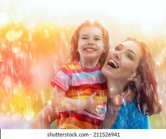 The Family Enjoys The Rain