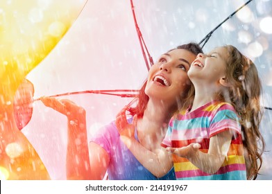 The Family Enjoys The Rain