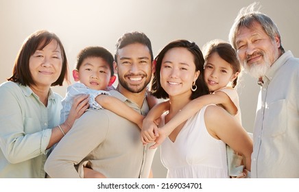 Family Is Everything. Cropped Shot Of A Happy Diverse Multi-generational Family At The Beach.