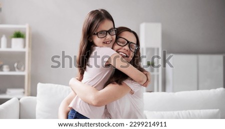 Family Eyeglasses. Happy Mother And Child Wearing Glasses