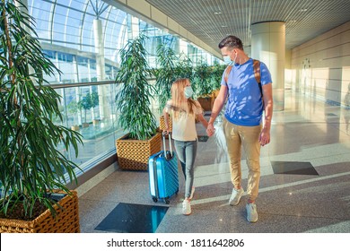 Family In Face Mask In Airport. Father And Child Wear Facemask During Coronavirus And Gripp