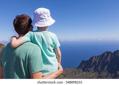 Family Of Father And Son Enjoying Kalalau Valley Together At Kauai Island, Hawaii