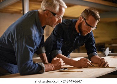 Family, father and son in a workshop, architect and woods with drawing or safety glasses with protection. Parent, men or teamwork with construction or building with planning for project or renovation - Powered by Shutterstock