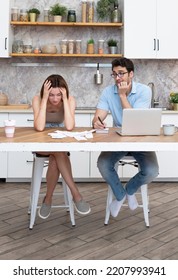 Family Financial Crisis Concept. Shocked And Stressed Couple Counting Expenses, Taxes And Debts. Laptop And Many Bills On The Table