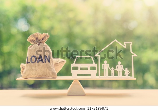 Family financial management, mortgage and payday\
loan or cash advance concept : Loan bags, family in a house on\
balance scale, depicts short term borrowing, high interest rate\
based on credit profile