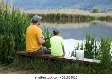 Family Fishing On Bountiful Pond (Lake), Utah, US