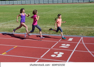 Family Fitness, Mother And Kids Running On Stadium Track, Training And Children Sport Healthy Lifestyle Concept
