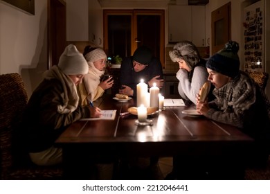 Family of five suffers in no heating and no electricity during an energy crisis in Europe causing blackouts. - Shutterstock ID 2212046441
