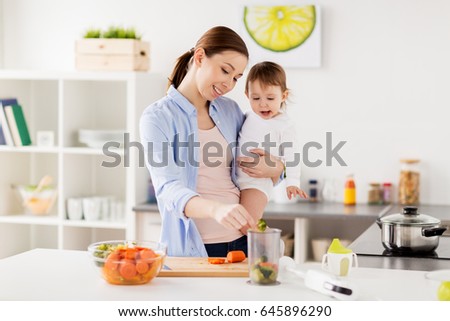 Similar – Mother with eating toddler.