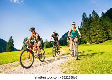 Family Of Four Cycling