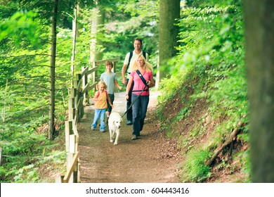 Family Of Four Hiking - Powered by Shutterstock