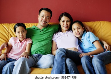 Family Four Sitting On Sofa Family Stock Photo 581475106 | Shutterstock