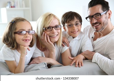 Family Of Four Wearing Eyeglasses