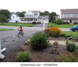 A Family Friendly Neighborhood In Which Children Can Ride Bicycles And Play In Each Other's Yards; Landisville, PA, USA 