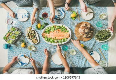 Family Or Friends Summer Party Or Seafood Dinner. Flat-lay Of Group Of Mutinational People With Different Skin Color At Big Table Eating Delicious Food Together. Summer Gathering Or Celebration