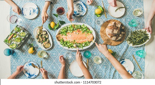 Family Or Friends Summer Party Or Seafood Dinner. Flat-lay Of Group Of Mutinational People With Different Skin Color At Big Table Eating Delicious Food Together. Summer Gathering Or Celebration