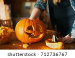 family fun activity - carved pumpkins into jack-o-lanterns for halloween close up