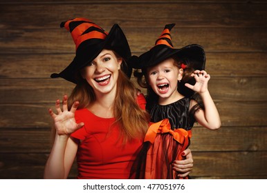 Family Fun Mother And Child Daughter Having Fun And Celebrate Halloween In Witch Costume