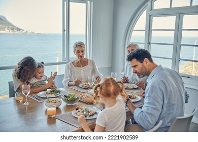 Family, generations and food, eating together in family home by the beach, healthy meal, nutrition and bonding. Big family, parents with grandparents and children eat at house by coast of Australia. - Powered by Shutterstock