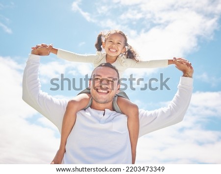 Family, girl child and father on holiday with clouds blue sky, sunshine and summer. Happy, care and love and dad playing with youth kid portrait on vacation break enjoying, having fun and piggyback