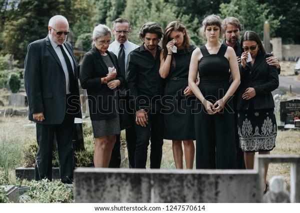 Family Giving Their Last Goodbyes Cemetery Stock Photo (Edit Now ...