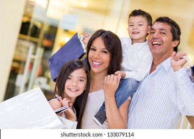 Family Going Shopping And Looking Very Happy